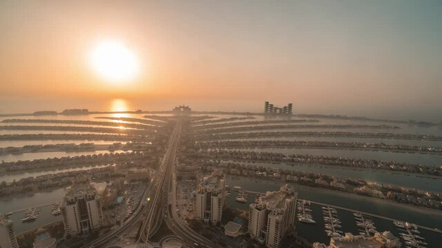 4k time lapse of the sun setting over the Palm Jumeirah artificial island in Dubai, UAE