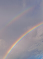 A double rainbow during sunset high resolution