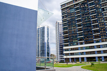 Obraz na płótnie Canvas Beautiful new built business building in a modern residential urban area