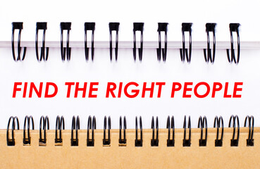 Text FIND THE RIGHT PEOPLE on white paper between white and brown spiral notepads.