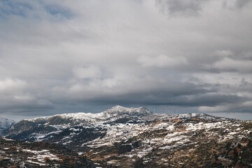 Obraz premium Winter mountain scenery. Top view from Mega Spileon Monastery. Popular winter travel destination in Kalavryta, Greece, Europe.