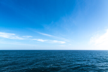 Seascape. Blue sky and white cloud.