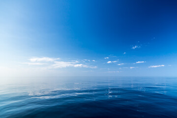 Fototapeta na wymiar Seascape. Blue sky and white cloud.