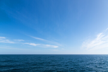Seascape. Blue sky and white cloud.