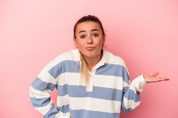 Young Russian woman isolated on pink background making up plan in mind, setting up an idea.