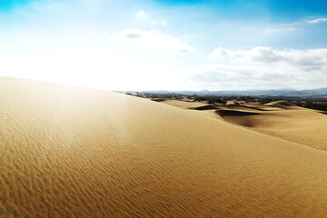 Blue sky and sand dunes. Sunny day.
