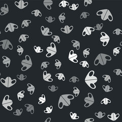 Grey Medical protective mask icon isolated seamless pattern on black background. Vector.
