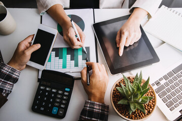 businesswoman hand working with laptop computer, tablet and smart phone in modern office with virtual icon diagram at modernoffice in morning light