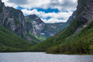 Fototapeta na wymiar Water with a mountain in the background - Gros Morne National Park - Western Brook Pond
