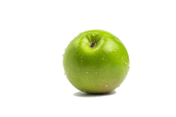 Fresh green apple with water drops isolated on white background with shadow.