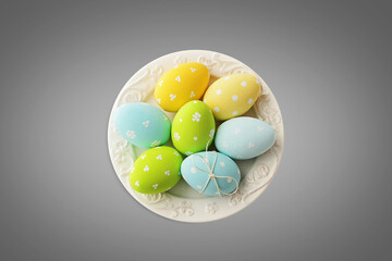 easter eggs in a basket on top angle grey background