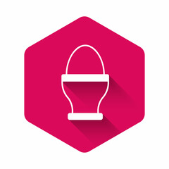 White Chicken egg on a stand icon isolated with long shadow background. Pink hexagon button. Vector