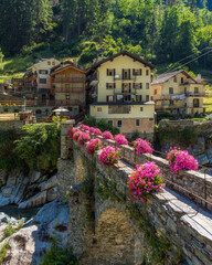 Fototapeta na wymiar The beautiful village of Frassiney in the Champorcher Valley. Aosta Valley, northern Italy.