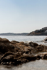 Rocks in the Water Along the Mykonos Coastline 