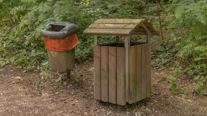 Wooden bin in woodland setting
