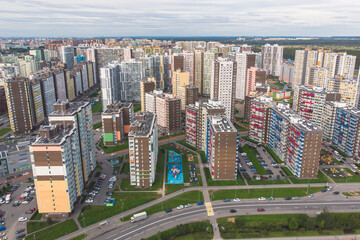 Aerial drone view of Kudrovo city skyline panorama, Saint-Petersburg outskirts, Leningrad oblast, Vsevolozhsky District high density living suburbia, high rise district area, Dybenko station, Russia