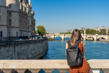 Female tourist contemplating Sainte Chapelle in Paris