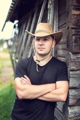 Young man in a cowboy hat.