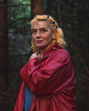 Portrait of Mid aged woman standing in forest