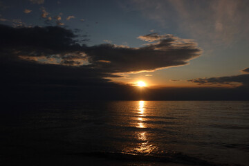 Fototapeta na wymiar Scenic sunset over the sea. Calm Baltic sea. Poland seaside, Dabki village and beach. Seascape