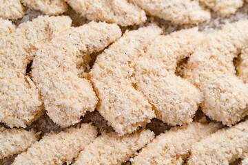 open box with frozen shrimp in batter. semi-finished products for deep frying. 