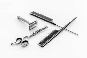 Barber tools with hairdressing scissors and combs