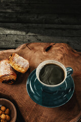 Hot Coffee in Rustic Cup with Pastry on Wood Surface with Room for Copy