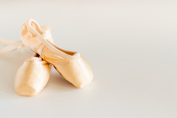 Ballet dancer set of pointe shoes or slippers with ribbon