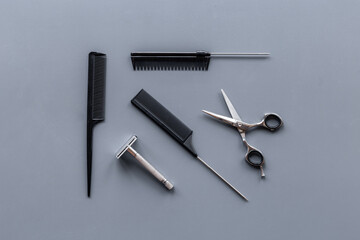 Barber tools with hairdressing scissors and combs