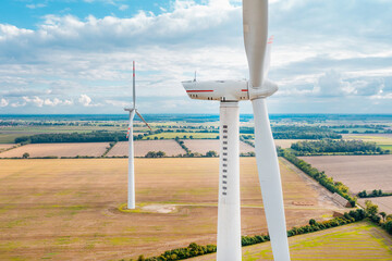 Windmills generate electricity in the fields. Alternative sources of energy, Wind turbines close-up...