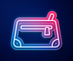 Fototapeta premium Glowing neon line Cosmetic bag icon isolated on blue background. Vector