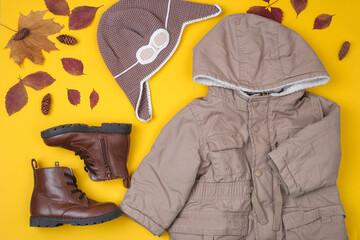 Fashionable children's clothing, shoes (canvas jacket with a hood, knitted aviator hat, brown...