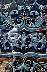 Fancy filigree etching on window, Camberwell, London