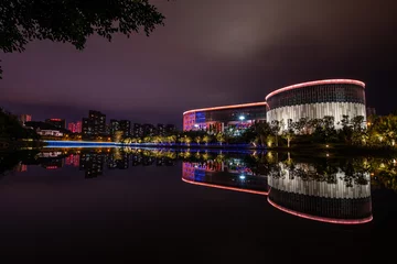 Tapeten The stream reflects the Putian Museum of China in the evening © chen