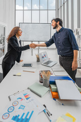 two businesss person handshaking after sucess business agreement negotiation