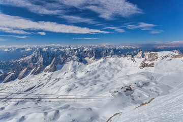 Obraz premium Garmisch Partenkirchen Germany, Zugspitze peak and Alps mountain range with snow in winter season