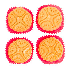 Top view Four mooncakes for Chinese Mid Autumn Festival celebration on white background.