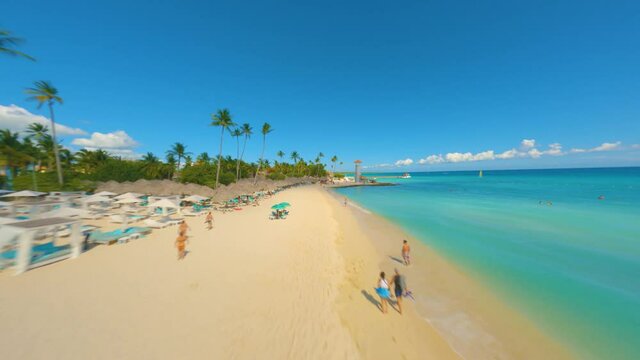 First person view drone shot over a Caribbean paradise beach and turquoise sea