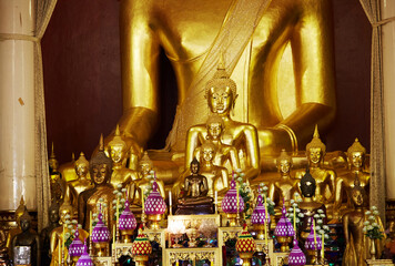 Golden Buddha statues, inside the temple. Chiang Mai, Thailand