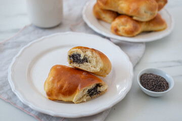 Traditional home made crescent rolls with poppy seeds