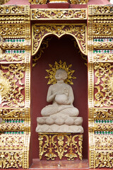 Fototapeta premium Stone statue of Buddha, outside the temple. Chiang Mai, Thailand