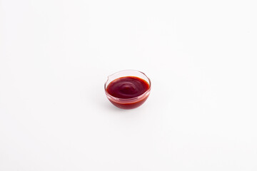 Ketchup or tomatose sauce on white background.
