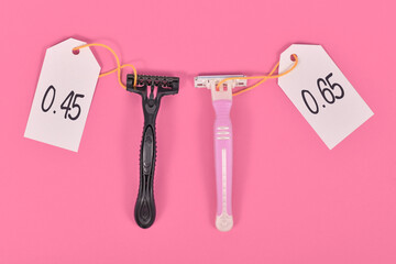 Concept for pink tax showing pink and black razor aimed at specific genders with different price tags - obrazy, fototapety, plakaty
