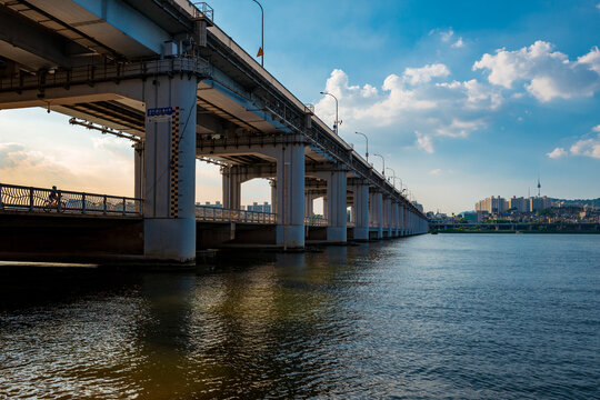 Jamsu and Banpo bridges over the Han River in Seocho-Gu and the N tower or Namsan tower in the background, Seoul, South Korea.