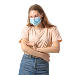 Young woman with applied medical patch against white background