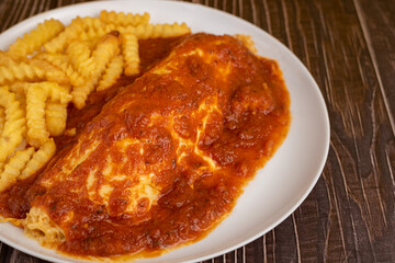 Pancake with dressing and salad