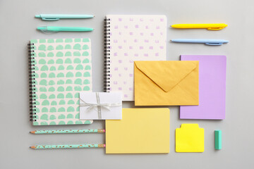 Stationery supplies and envelopes on table