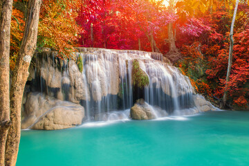 Fototapeta na wymiar wonder Waterfall in Deep forest at Erawan waterfall National Park.