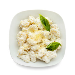 Bowl of delicious gnocchi with creamy sauce on white background