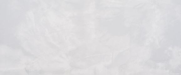 Unobtrusive smooth light gray concrete texture background